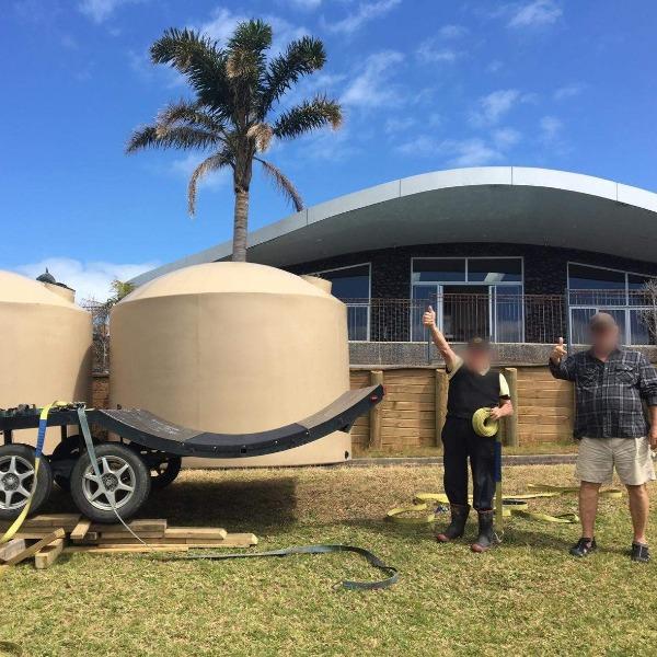 2 x 30,000 litre beige water tanks delivered to a beautiful spot Far North